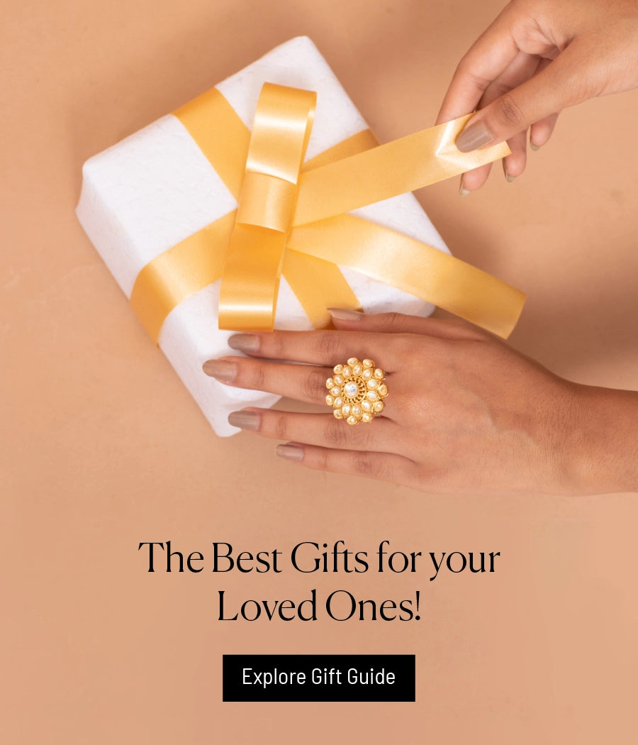 Woman's hands wearing a beautiful finger ring, opening a present and text written "The Best Gift For Your Loved Ones!"