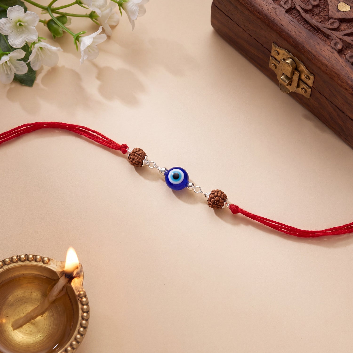 Trinetra Rudraksha Silver Rakhi
