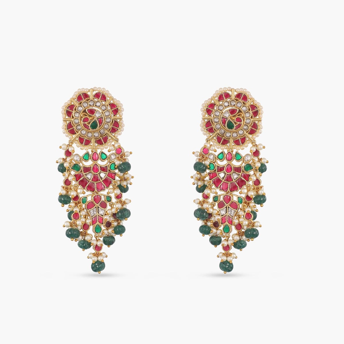A picture of Indian artificial jewelry. It is a pair of gold-plated earrings with red Kempu stones and pearl details.