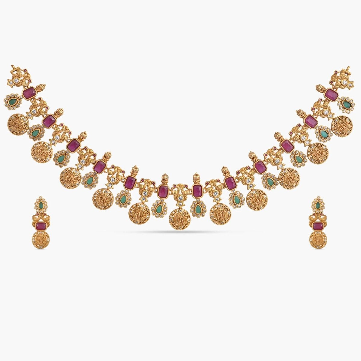 A picture of Indian artificial jewelry. It is a traditional necklace set with red and green gemstones, featuring Cubic Zirconia.