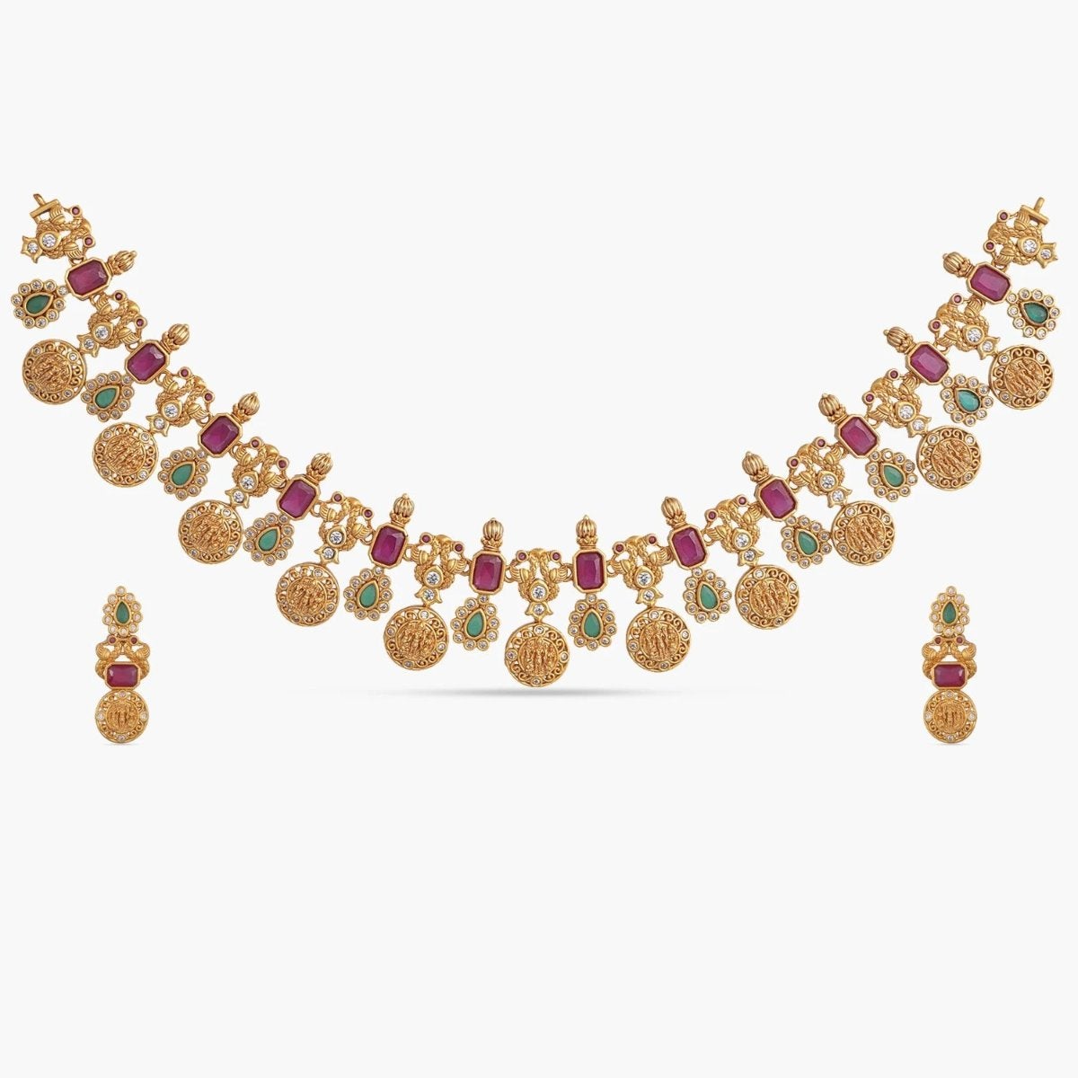 A picture of Indian artificial jewelry. It is a traditional necklace set with red and green gemstones, featuring Cubic Zirconia.
